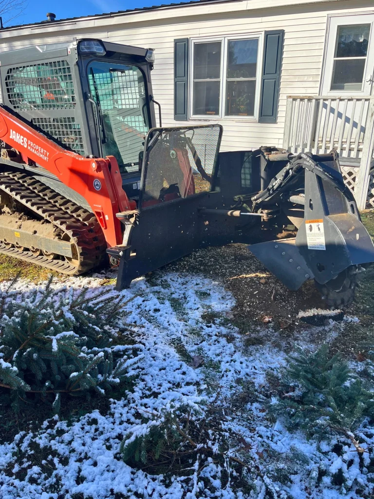 brush being cleared in front of a porch
